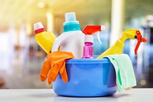 Professional office cleaners working in an EC1 business workspace